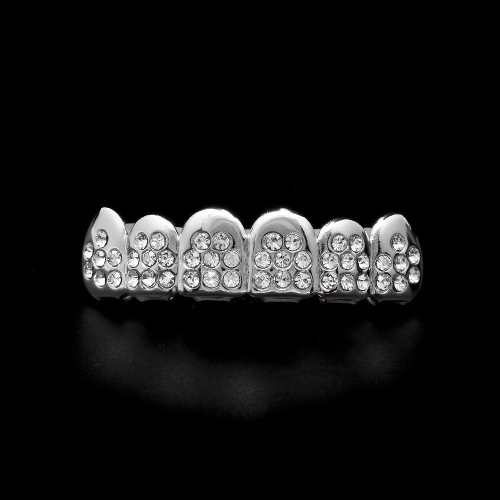 Hip-hop diamond-encrusted and gold-plated teeth grillz - Rapper's Digest